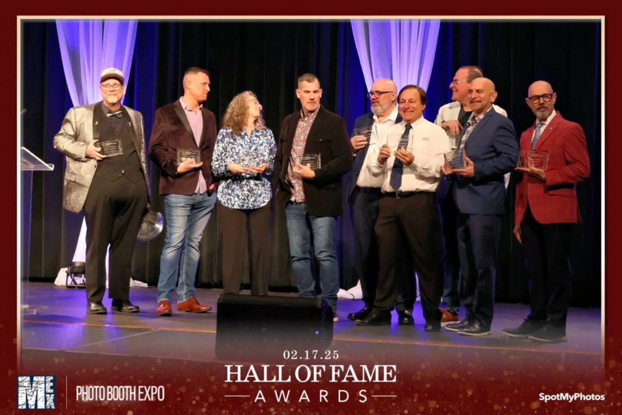 Scott Siewert and seven other DJs on stage receiving 2025 Hall of Fame awards at the Mobile Entertainment Expo