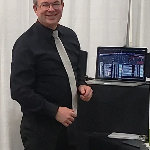 Photo of Russ at his DJ rig — premier entertainer with The Fun DJ